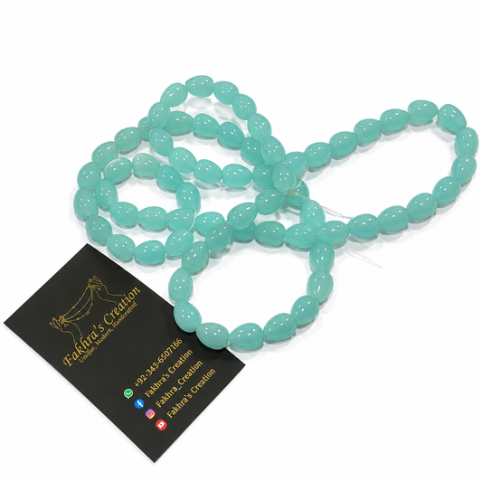 8x11  Turquoise Glass Drop Beads Each String